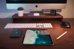a tablet and phone on a desk
