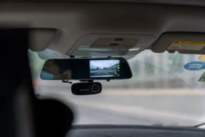 A car with a Dash Cam installed, capturing the surrounding scenery