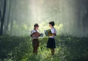 Two children reading books in a serene garden as part of a language teaching guide.