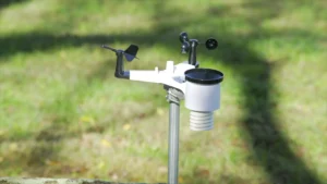 Weather station with contrasting white and black umbrella.