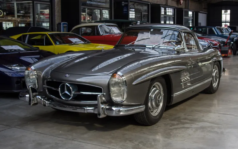Mercedes 300SL Roadster, a classic convertible car with sleek design and powerful performance.